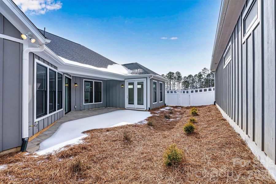 Exterior details and patio area of a home in The Courtyards at Lake Davidson, Mooresville (Image 28).