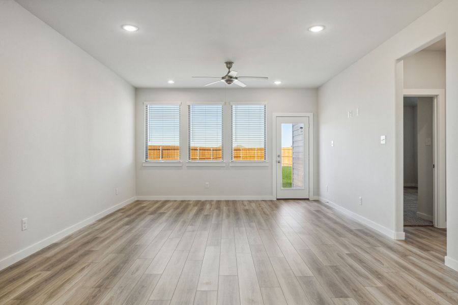 Living Room in the Willow home plan by Trophy Signature Homes – REPRESENTATIVE PHOTO