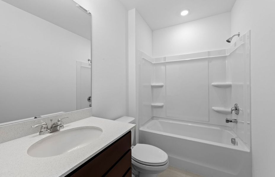 Furnished interior view inside a new home in Caloosa Cove, Labelle (Image 8).