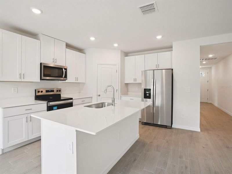 Furnished interior view inside a new home in Salt Meadows - Classic Series, Parrish (Image 3).