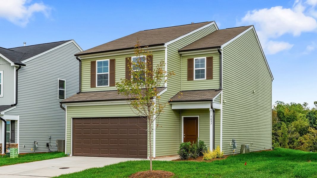Front exterior of a new home in Bell West, Kernersville, NC, highlighting curb appeal (Image 21).