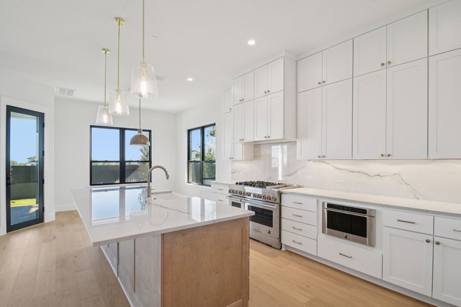 Furnished interior view inside a new home in Milky Way at River Place, Austin (Image 19).