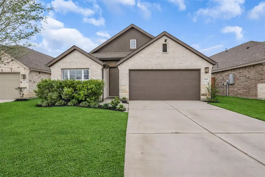 Front exterior of a new home in , Hockley, TX, highlighting curb appeal (Image 2). Front exterior of a new home in , Hockley, TX, highlighting curb appeal (Image 2).
