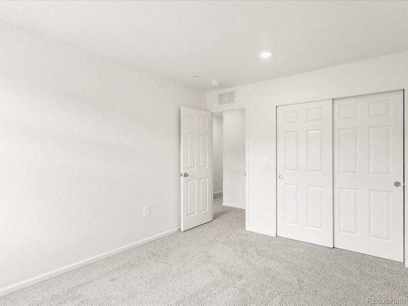 Spacious, unfurnished interior of a new home in Poudre Heights: The Meadow Collection, Windsor (Image 27).