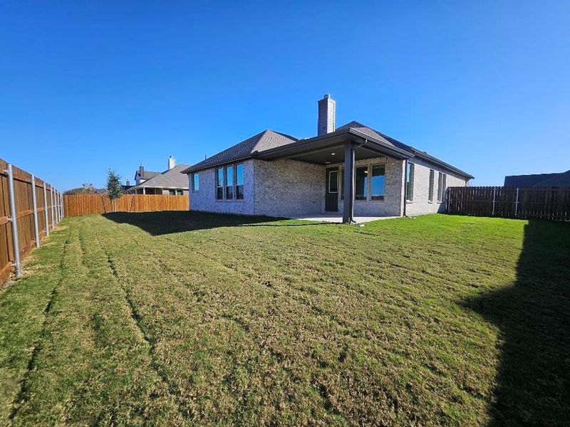 Exterior details and patio area of a home in Aero Vista, Caddo Mills (Image 3). Exterior details and patio area of a home in Aero Vista, Caddo Mills (Image 3).
