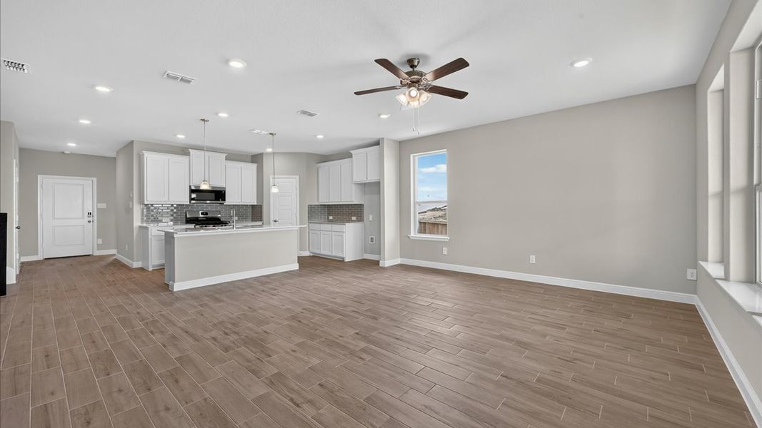 Representative unfurnished interior of a home built from the Glenwood by D.R. Horton in Bluestem, Rhome (Image 14).