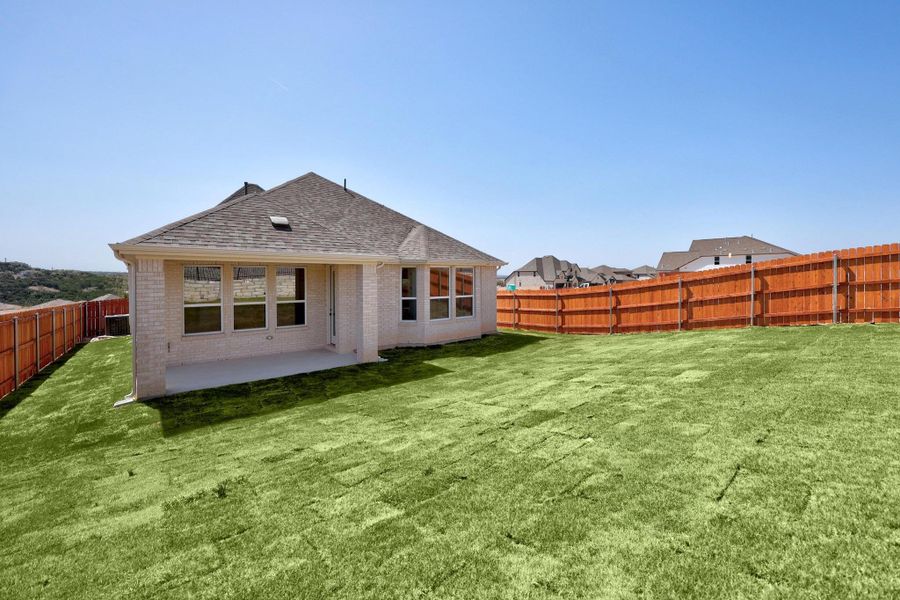 Exterior details and patio area of a home in Lakeside at Tessera on Lake Travis, Lago Vista (Image 3).