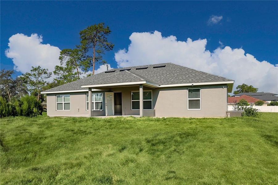 Front exterior of a new home in Ocala Waterway / Kingsland Country Estates, Ocala, FL, highlighting curb appeal (Image 20).