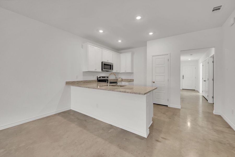 Furnished interior view inside a new home in Freedom Ranch Duplexes, Copperas Cove (Image 4).
