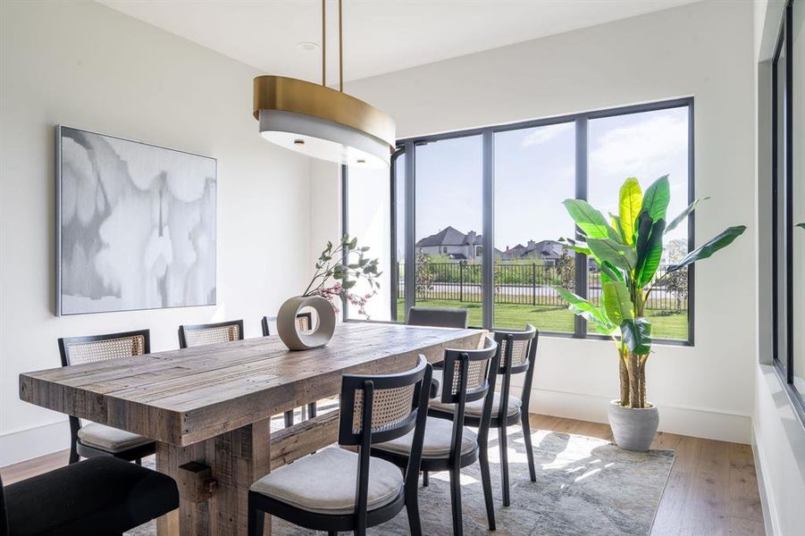 Dining area featuring hardwood / wood-style floors