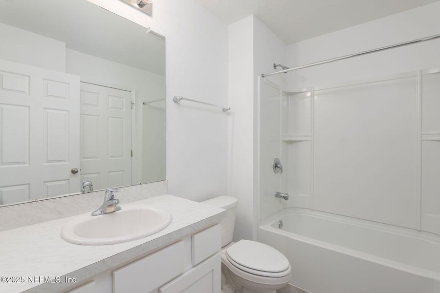 Furnished interior view inside a new home in Equinox East, Jacksonville (Image 7).