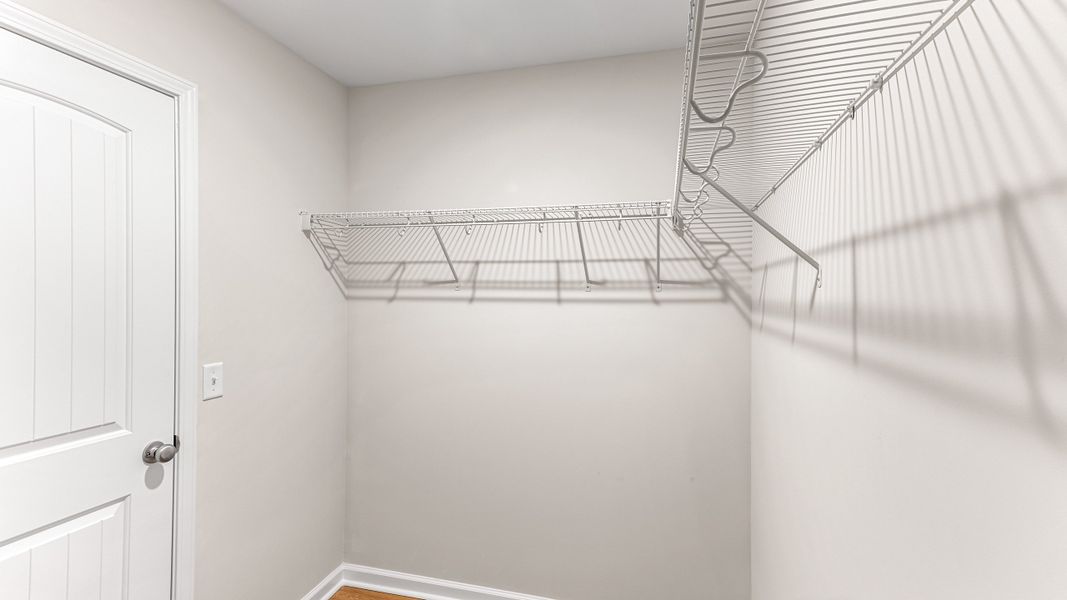 Representative unfurnished interior of a home built from the The Holly by Smith Family Homes in Lakeview Pines, Statesboro (Image 27).