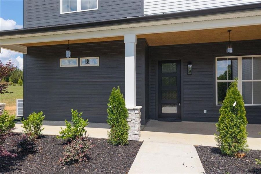 Exterior details and patio area of a home in , Carrollton (Image 3).