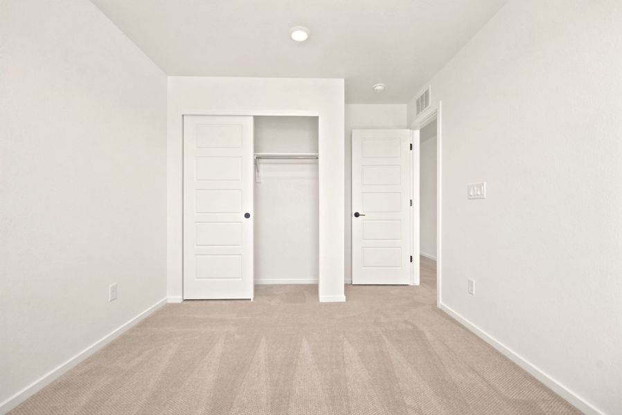 Spacious, unfurnished interior of a new home in Sky Ranch, Watkins (Image 30). Spacious, unfurnished interior of a new home in Sky Ranch, Watkins (Image 30).
