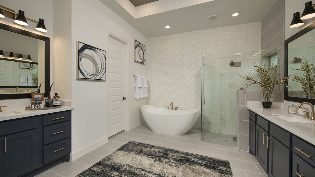 Representative furnished interior of a home built from the 3578W by Perry Homes in Lakes of Cane Island, Katy (Image 12).