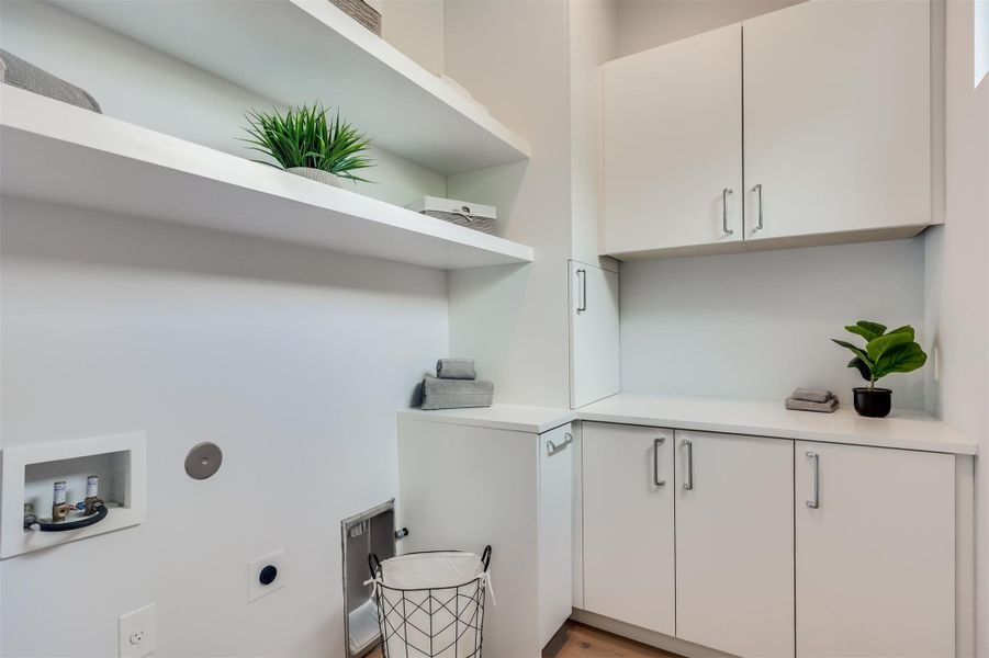 Centrally located where the life happens, featuring a genius laundry chute that catches everything from the third floor