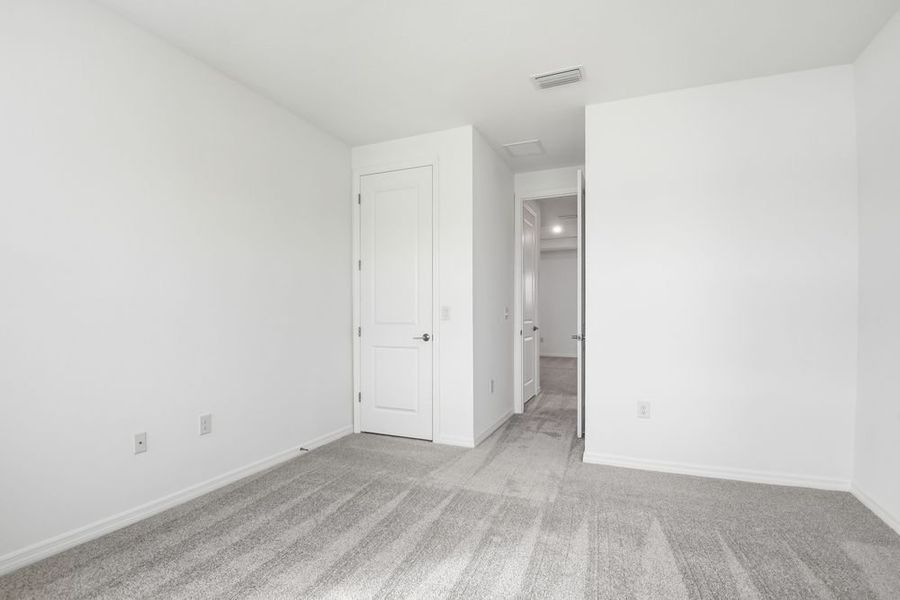 Representative unfurnished interior of a home built from the Barbados by Taylor Morrison in Ardisia Park, New Smyrna Beach (Image 40).
