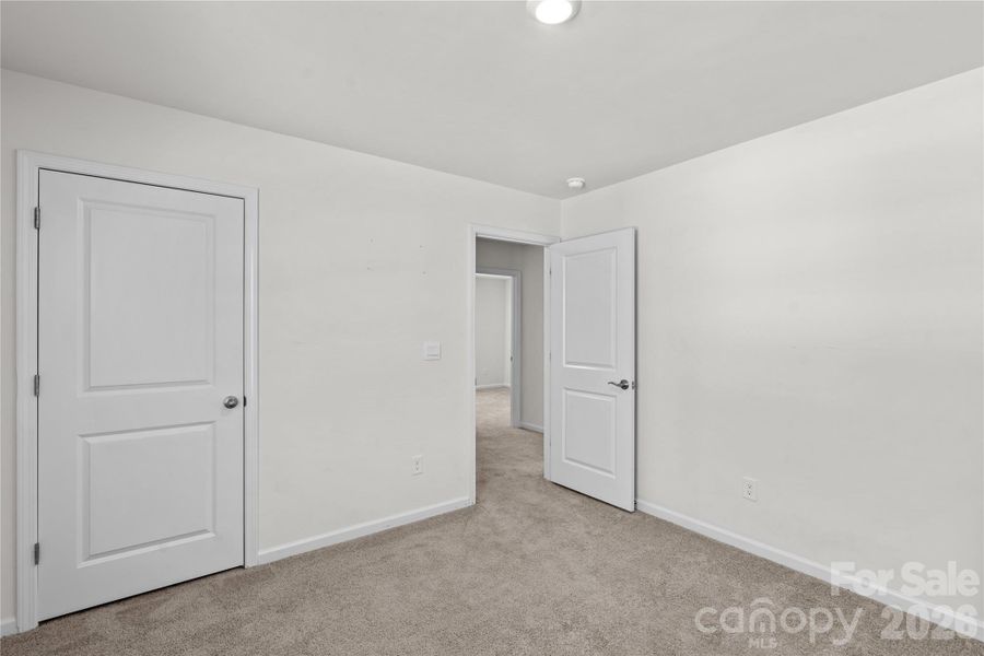 Spacious, unfurnished interior of a new home in Wallace Springs, Statesville (Image 24).