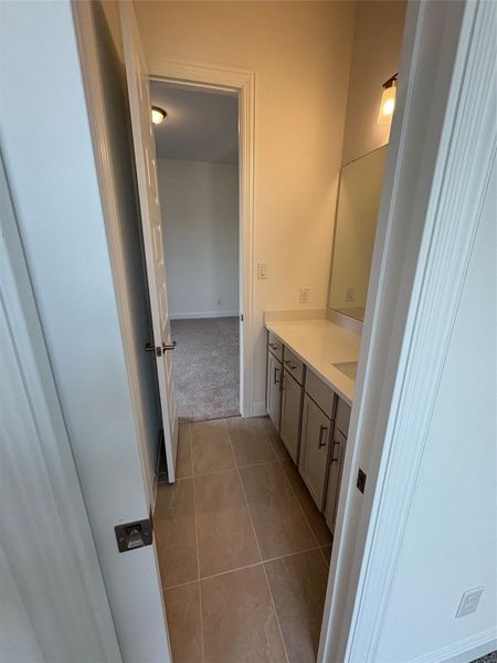 Bathroom with vanity and tile patterned floors Bathroom with vanity and tile patterned floors