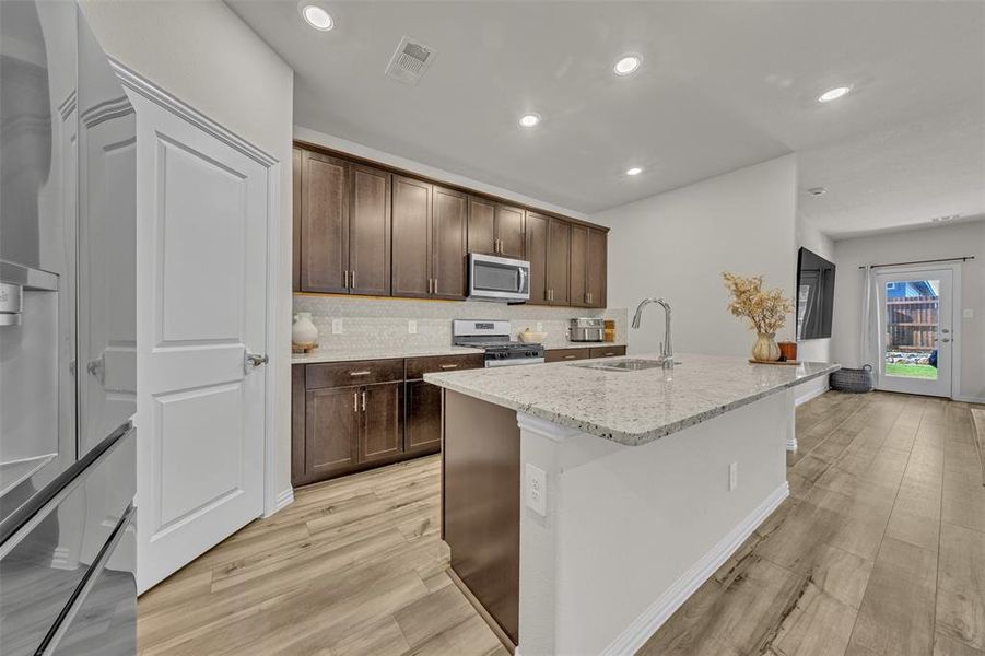 Furnished interior view inside a new home in Briarwood Hills - Highland Series, Forney (Image 13). Furnished interior view inside a new home in Briarwood Hills - Highland Series, Forney (Image 13).