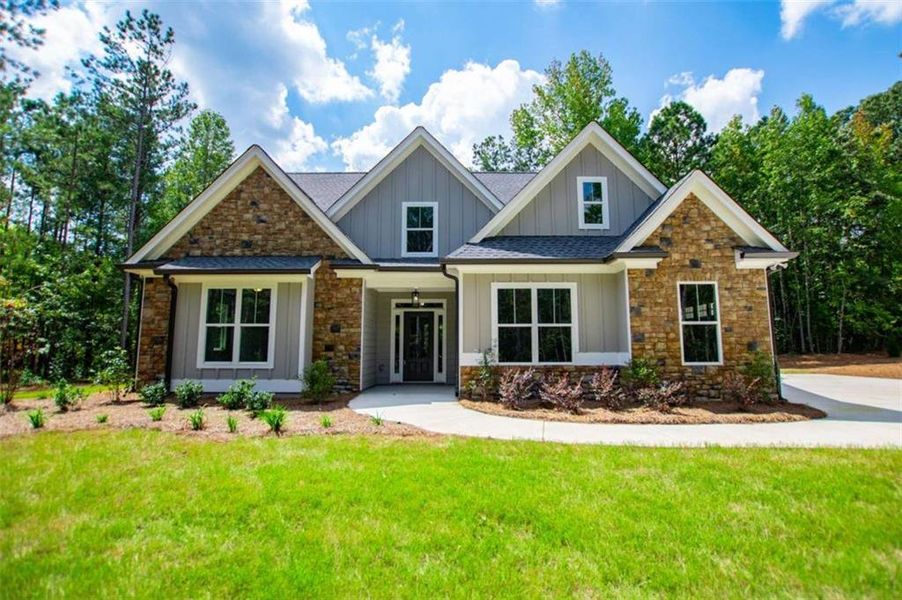 Front exterior of a new home in , Douglasville, GA, highlighting curb appeal (Image 34).