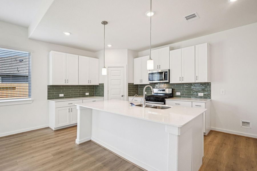 Photo is not of the actual home, but is an inspirational photo of builder’s model home and may depict options, furnishings, and/or decorator features that are not included