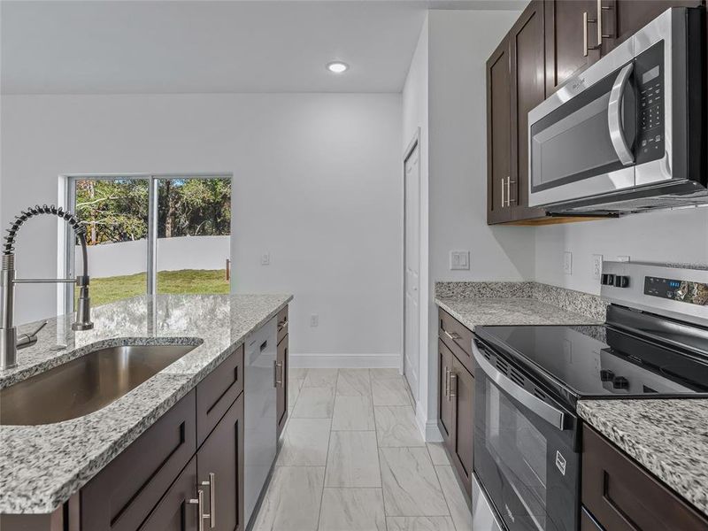 Furnished interior view inside a new home in , Ocala (Image 6).