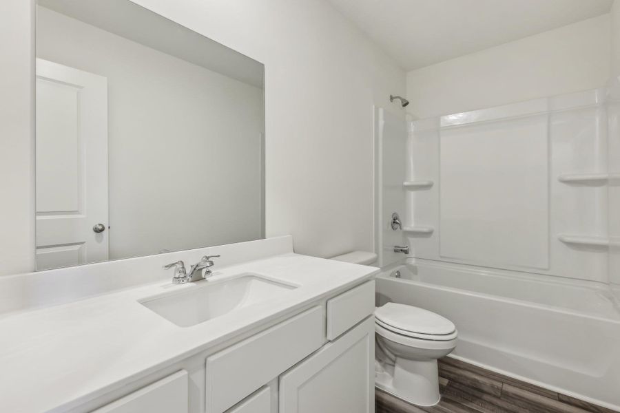 Furnished interior view inside a new home in Castlewood South, Taylor (Image 5).