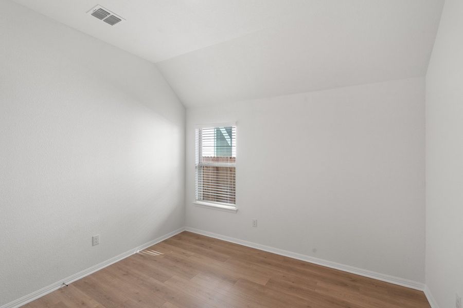 Spacious, unfurnished interior of a new home in The Hills of Bear Creek, Manchaca (Image 11).