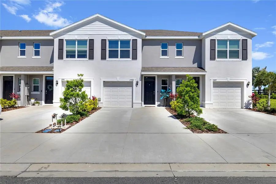 Front exterior of a new home in , Bradenton, FL, highlighting curb appeal (Image 28).
