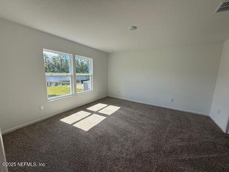 Spacious, unfurnished interior of a new home in Grand Reserve, Bunnell (Image 33).