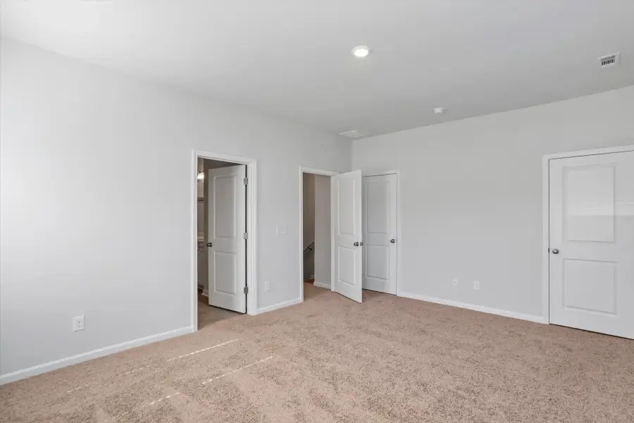 Spacious, unfurnished interior of a new home in West Main Townhomes, Sanford (Image 16).