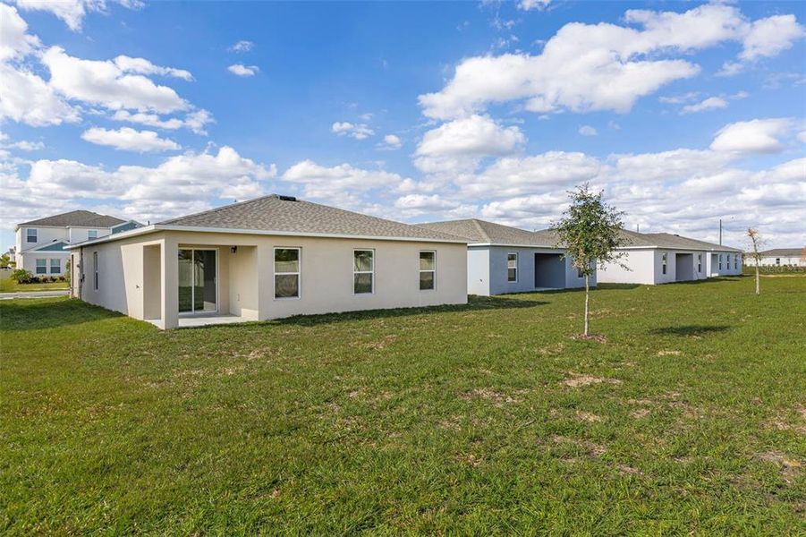 Exterior details and patio area of a home in The Grove at Scenic Terrace, Lake Hamilton (Image 3).