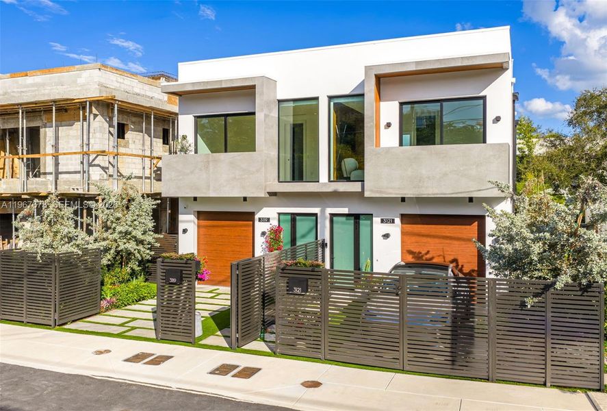 Front exterior of a new home in , Miami, FL, highlighting curb appeal (Image 42).