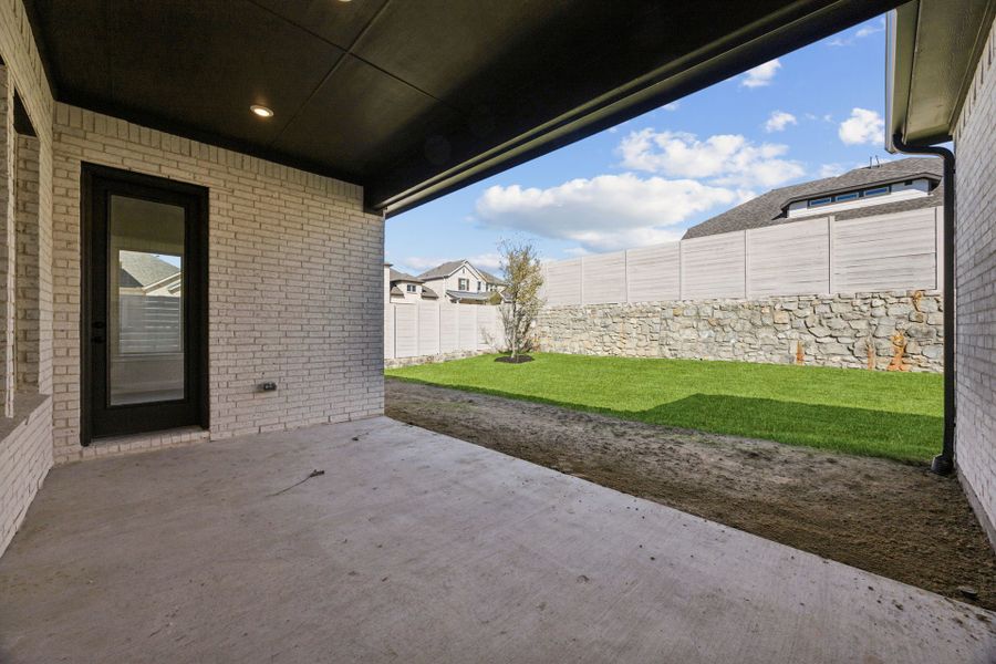 Exterior details and patio area of a home in Painted Tree Lakeside, McKinney (Image 27). Exterior details and patio area of a home in Painted Tree Lakeside, McKinney (Image 27).