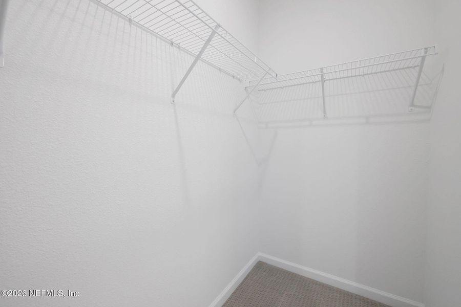 Spacious, unfurnished interior of a new home in Brook Forest, St. Augustine (Image 32).