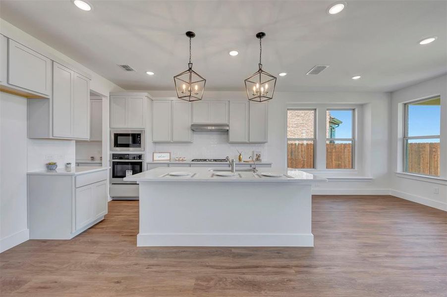 Furnished interior view inside a new home in Chaparral Park, Oak Point (Image 13).