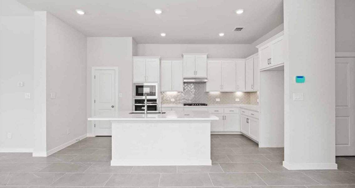 Furnished interior view inside a new home in Village at Three Oaks, Seguin (Image 5). Furnished interior view inside a new home in Village at Three Oaks, Seguin (Image 5).