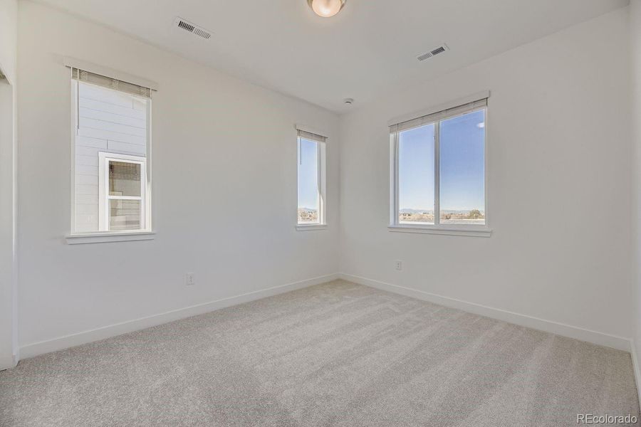 Spacious, unfurnished interior of a new home in Vermilion Creek: The Skyline Collection, Centennial (Image 9).
