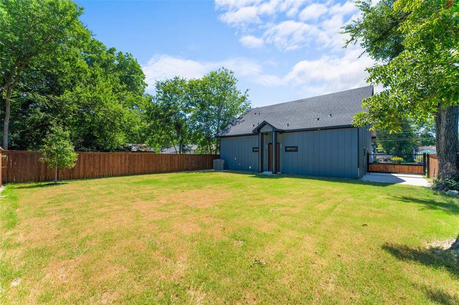 View of fenced backyard