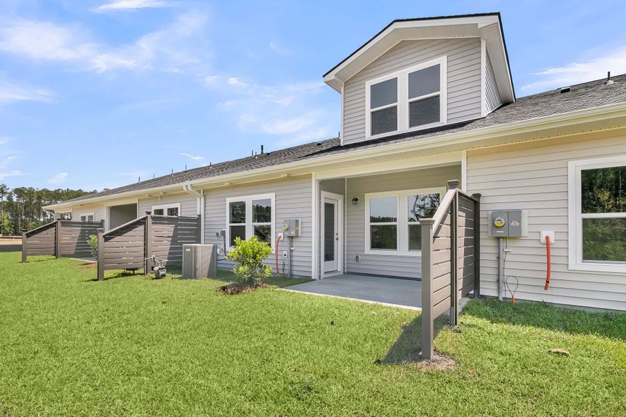Exterior details and patio area of a home in Hammock Walk at Nexton, Summerville (Image 16).