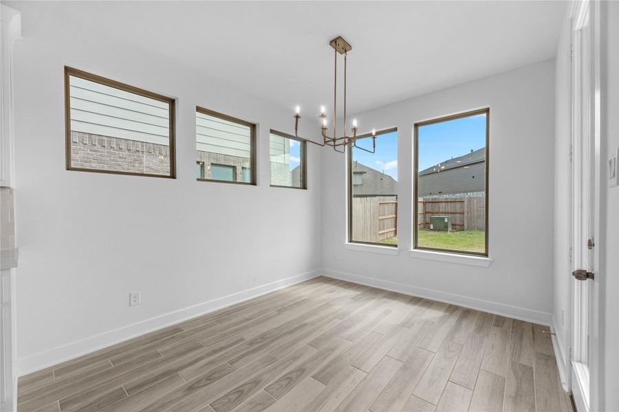 Spacious, unfurnished interior of a new home in Sunterra, Katy (Image 15).