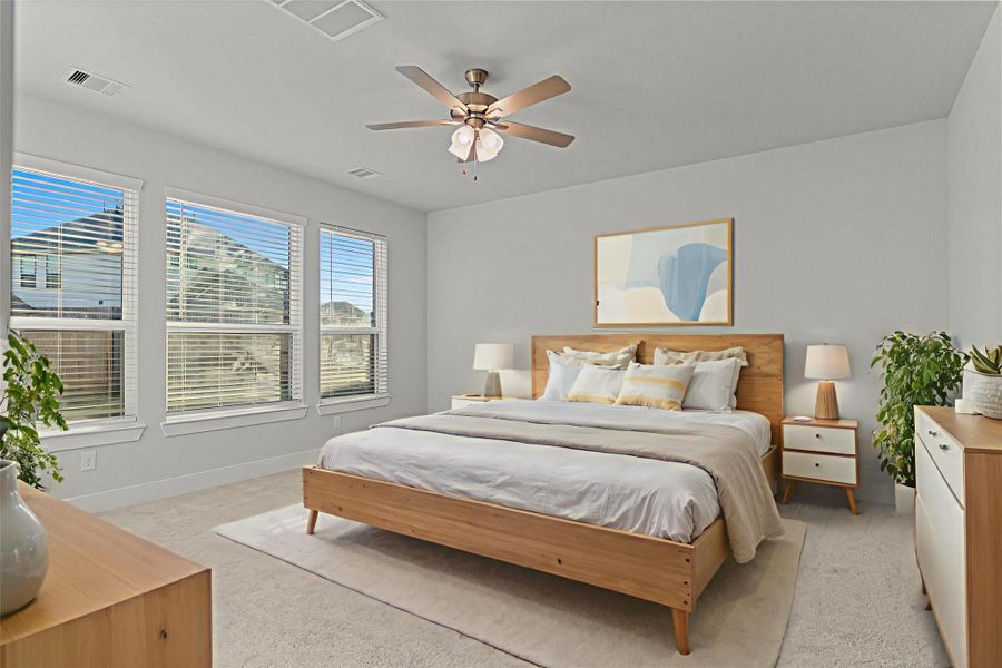 Virtually staged: The primary bedroom is showcased as a serene retreat, with large windows inviting in natural light and space for your favorite furnishings. The neutral palette offers a calm setting that complements any style. Virtually staged: The primary bedroom is showcased as a serene retreat, with large windows inviting in natural light and space for your favorite furnishings. The neutral palette offers a calm setting that complements any style.