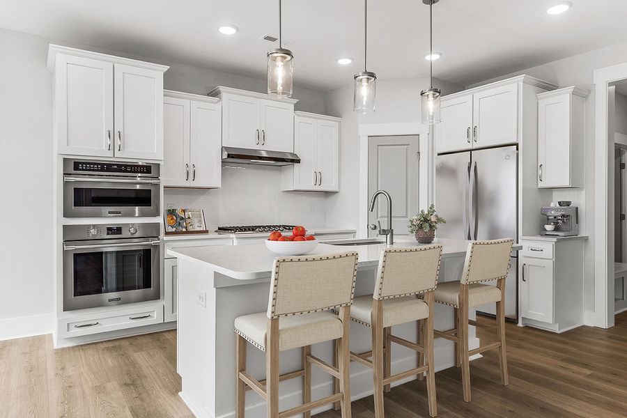 Representative furnished interior of a home built from the The Chandler by RobuckHomes in Windwater, Hampstead (Image 8).