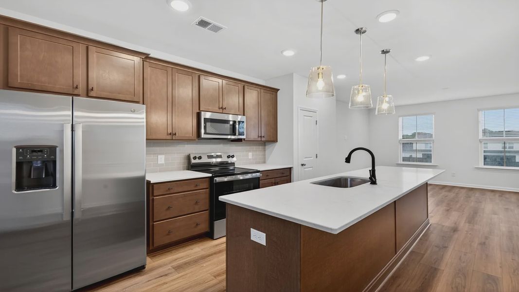 Furnished interior view inside a new home in Clear Springs Townhomes, North Charleston (Image 4).