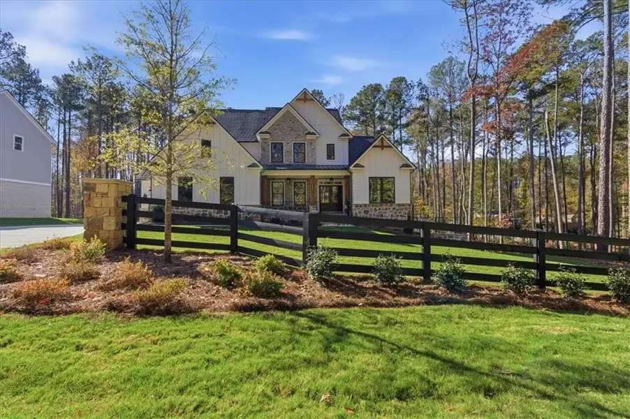 Front exterior of a new home in Ford Landing, Acworth, GA, highlighting curb appeal (Image 2). Front exterior of a new home in Ford Landing, Acworth, GA, highlighting curb appeal (Image 2).