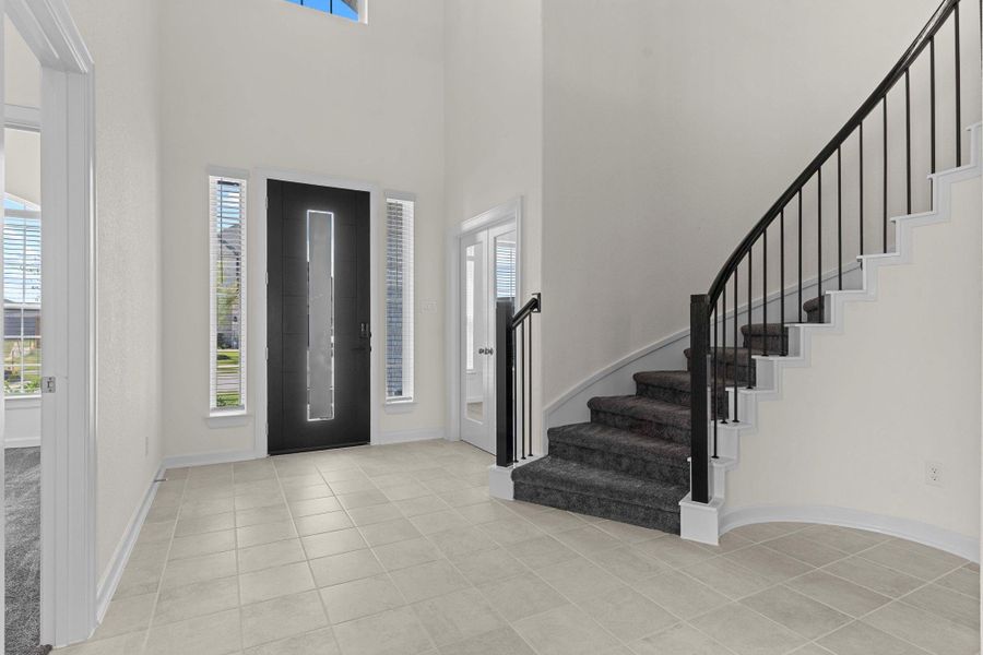 Look to your right and notice the French Doors that will lead to your Home Office. Then to the left you will discover the Guest Bedroom downstairs. Wait till you walk in and see the amazing sweeping iron stairway and the dramatic high ceilings! What a Wow Factor! The New Frisco presented by CastleRock Communities Homes! Look to your right and notice the French Doors that will lead to your Home Office. Then to the left you will discover the Guest Bedroom downstairs. Wait till you walk in and see the amazing sweeping iron stairway and the dramatic high ceilings! What a Wow Factor! The New Frisco presented by CastleRock Communities Homes!