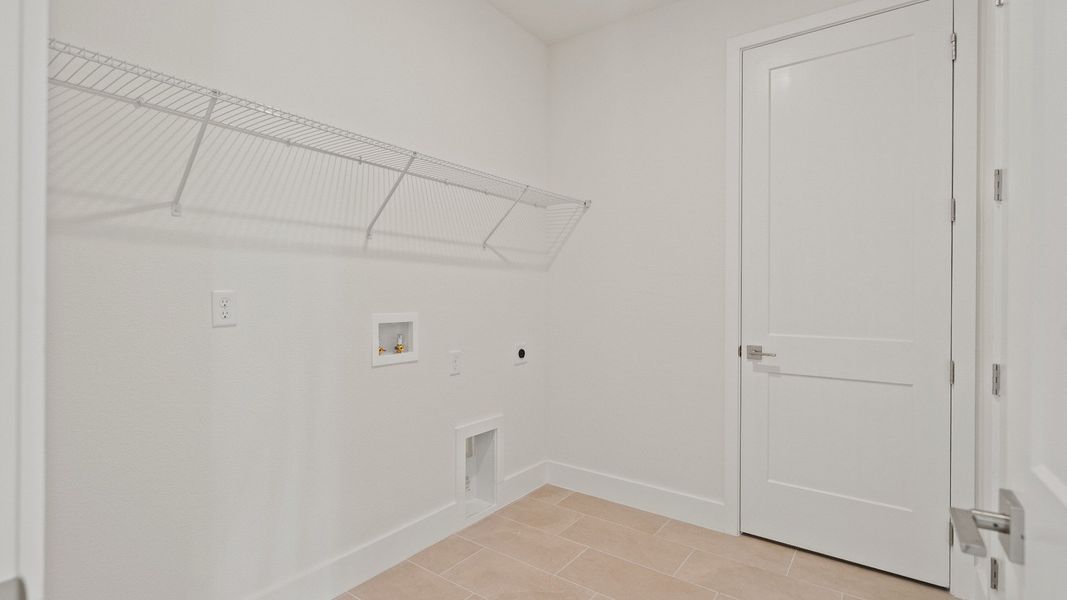 Laundry Room of the Buttonwood by DRB Homes at Trailside in Mount Dora, FL.