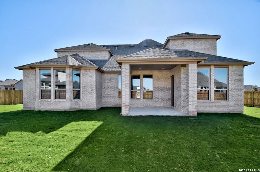 Exterior details and patio area of a home in Alsatian Oaks, Castroville (Image 3).