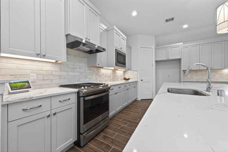 Furnished interior view inside a new home in Artavia, Conroe (Image 9).